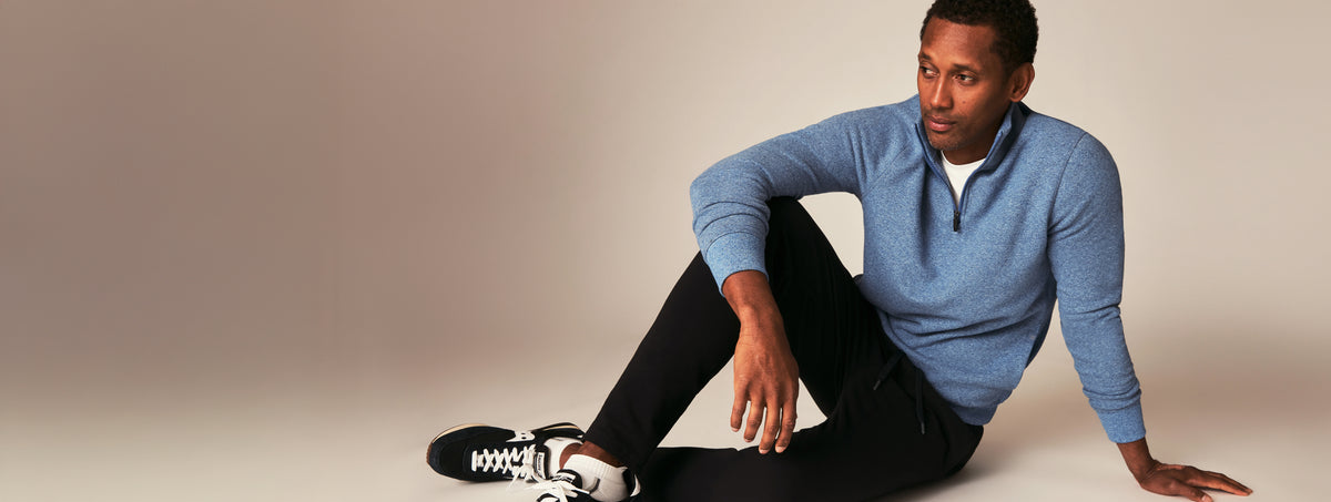 Man wearing ACE Quarter-Zip and ACE Sweatpants