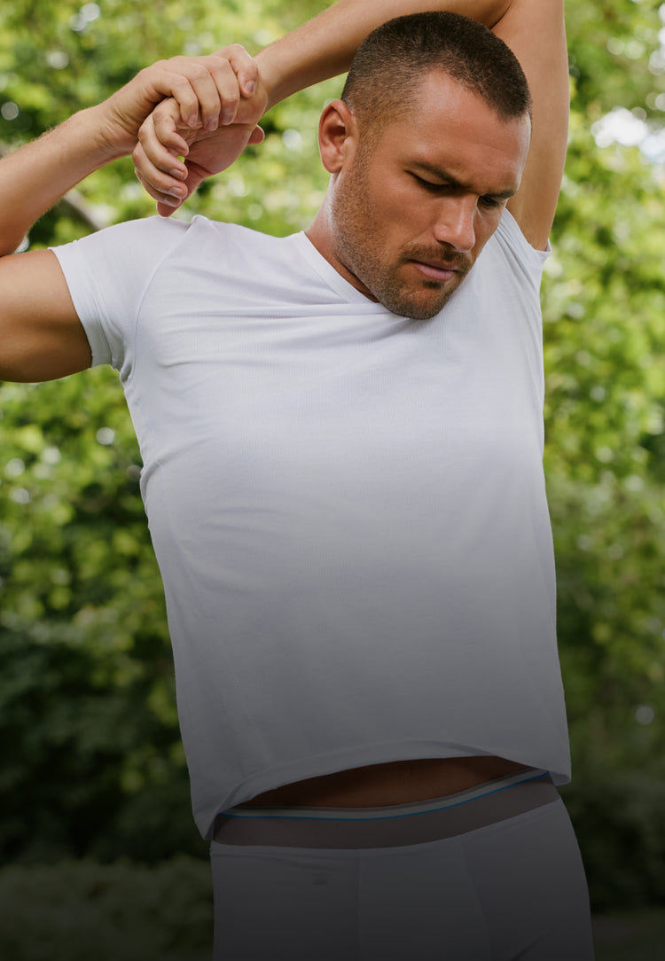 Man wearing Airknitx cotton v-neck Undershirt in Bright White
